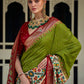 Contemporary Patola Silk Green Aari Work Saree