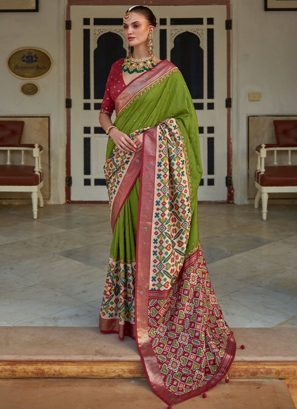 Contemporary Patola Silk Green Aari Work Saree