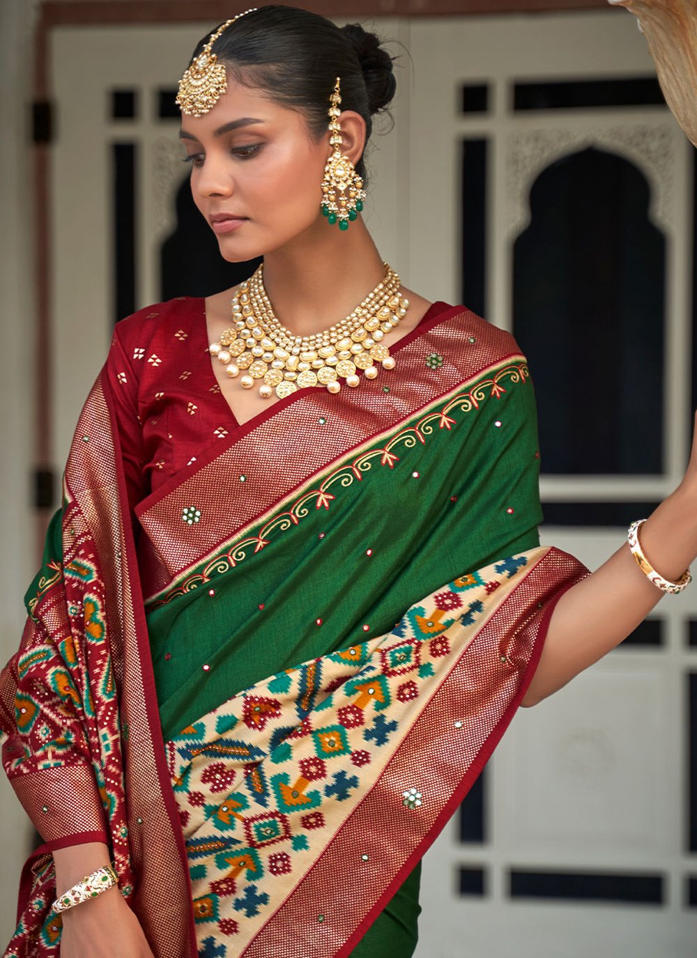 Classic Patola Silk Green Aari Work Saree