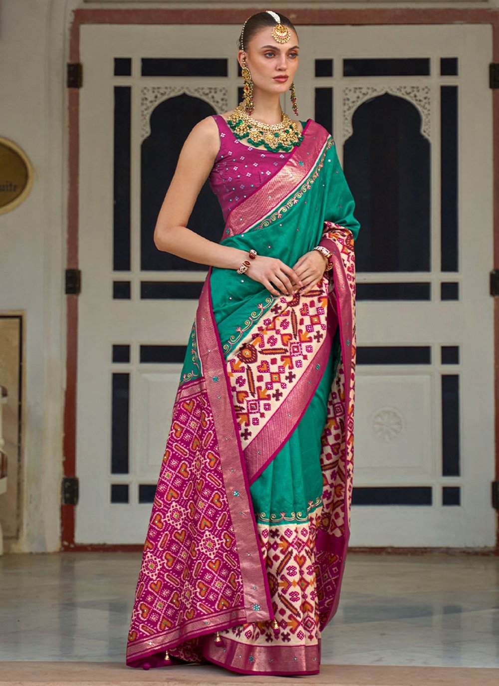 Contemporary Patola Silk Sea Green Aari Work Saree