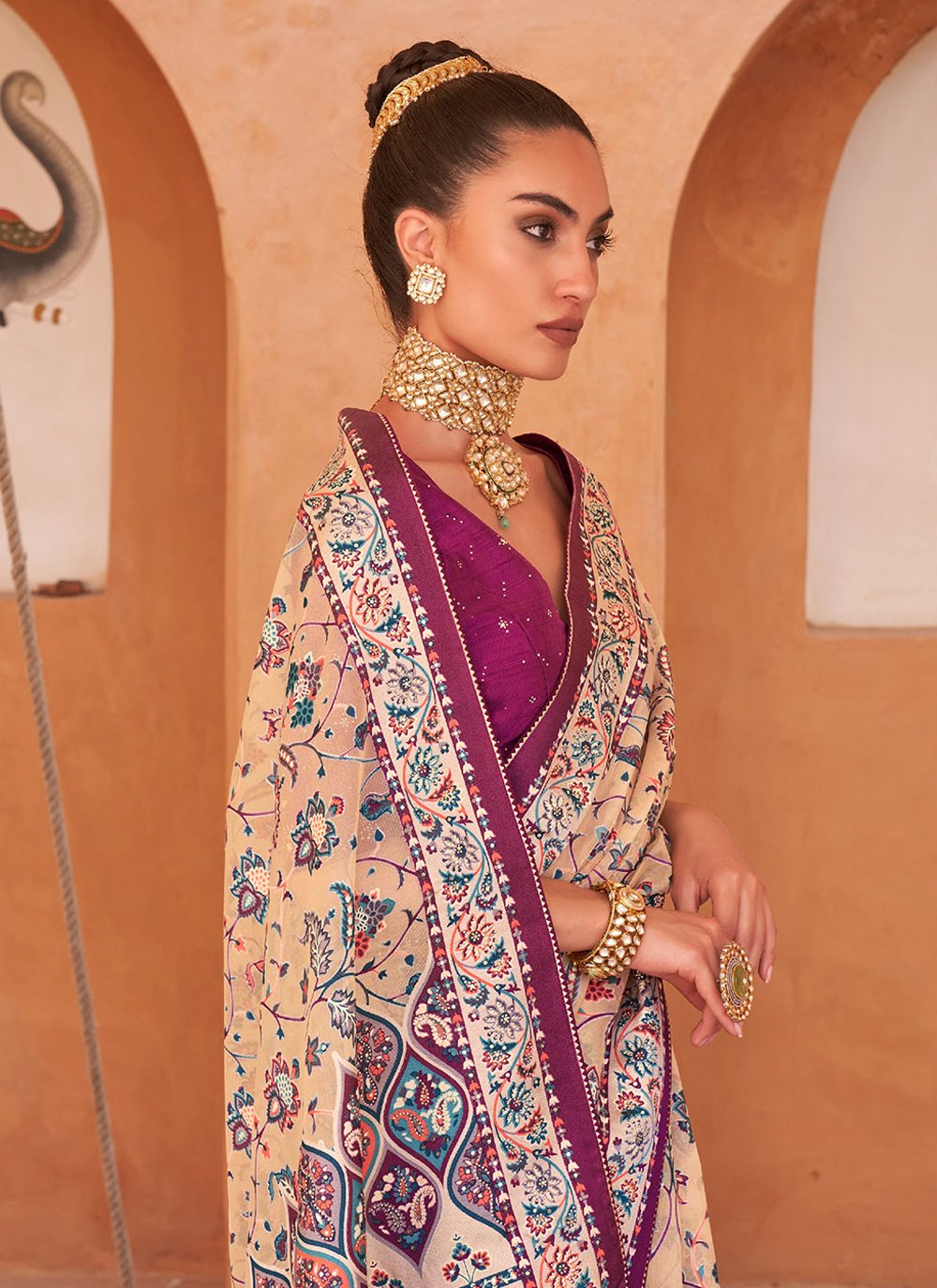 Contemporary Brasso Peach Purple Fancy Work Saree