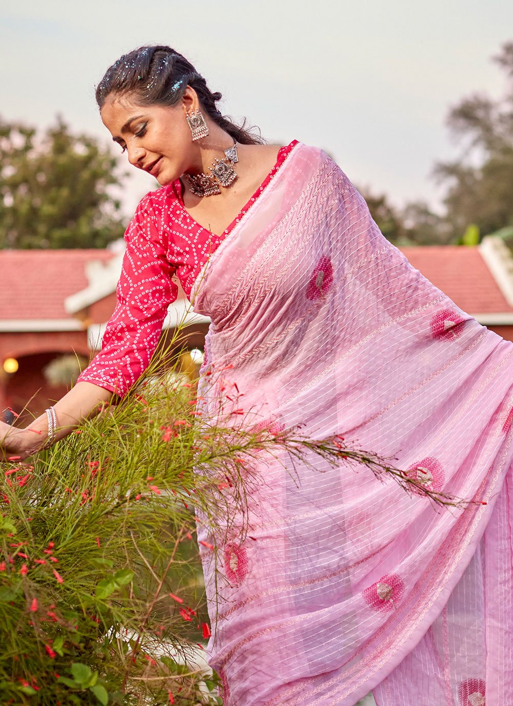 Classic Georgette Pink Embroidered Saree