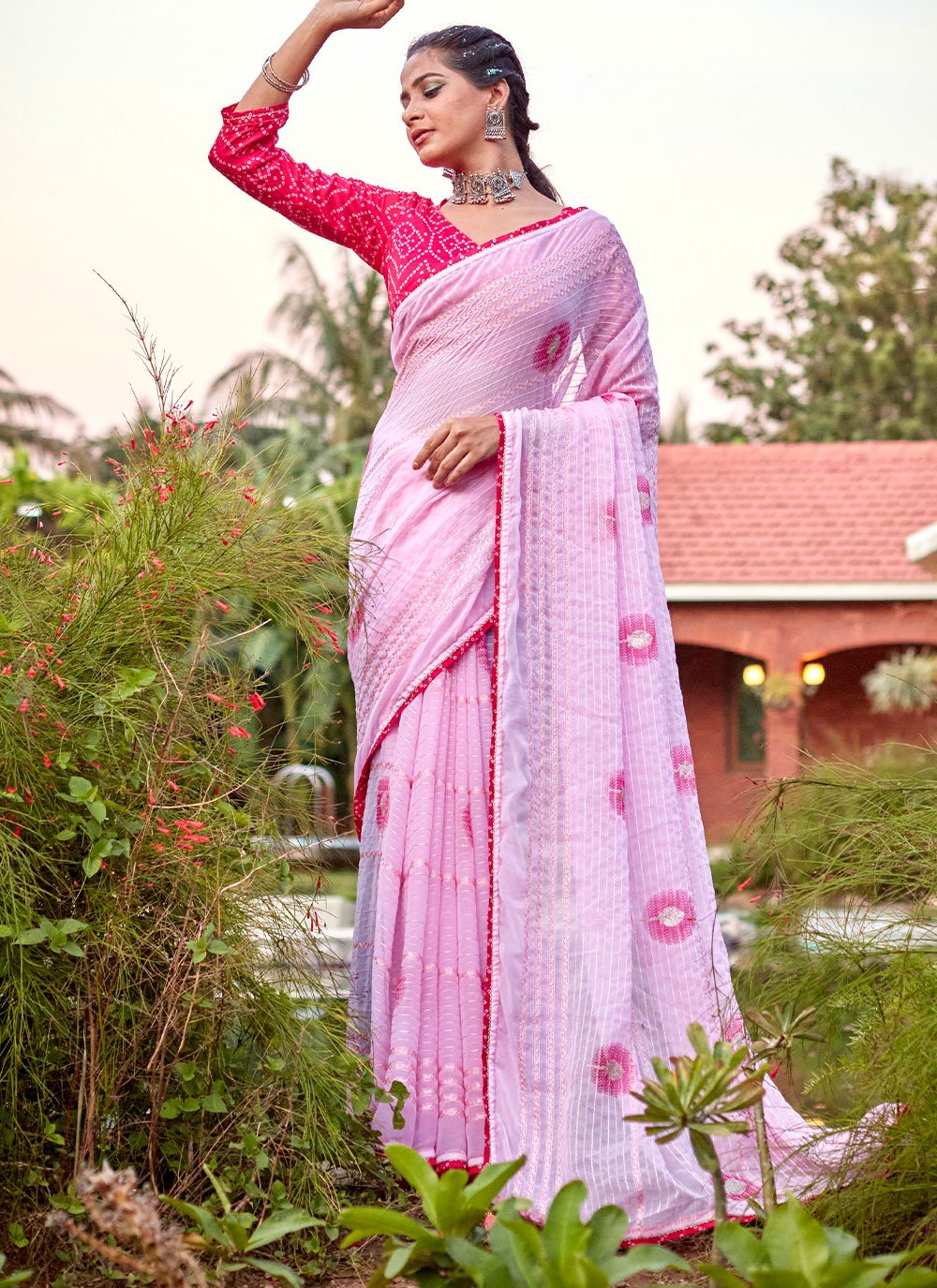 Classic Georgette Pink Embroidered Saree