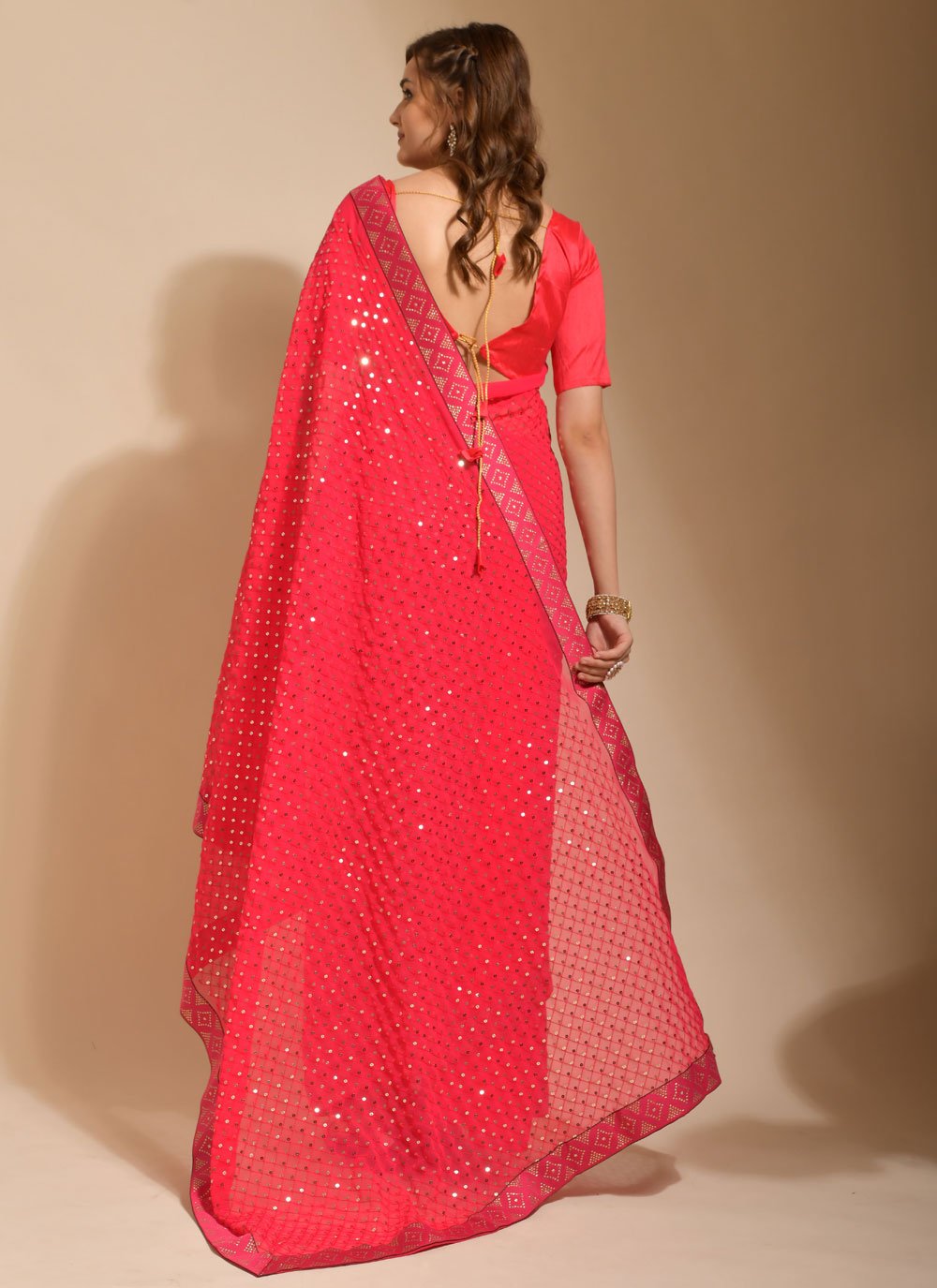 Classic Georgette Pink Embroidered Saree