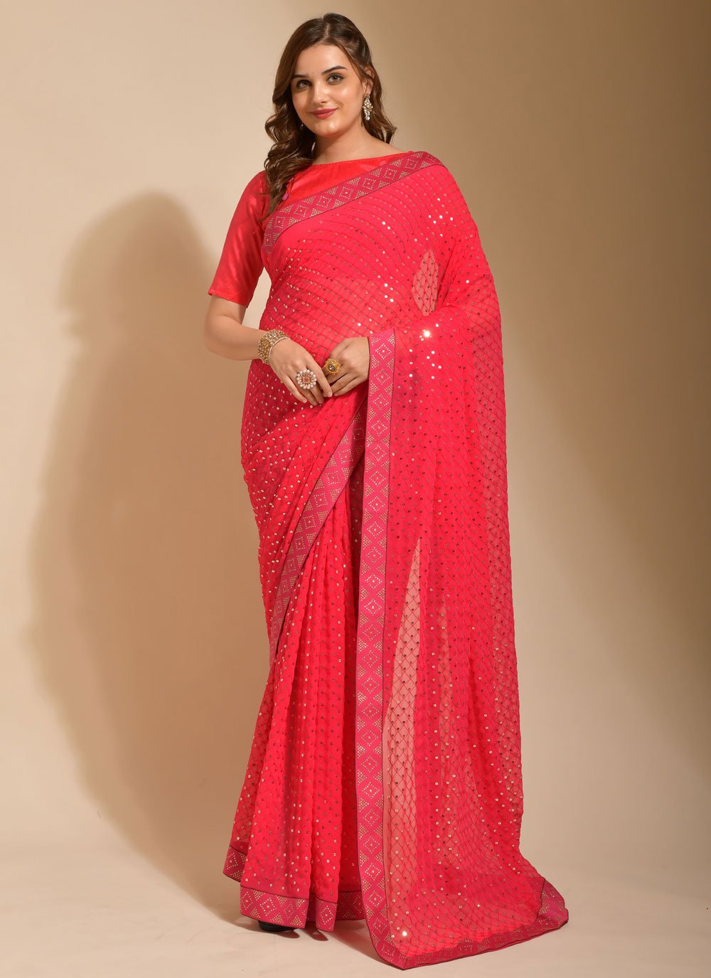 Classic Georgette Pink Embroidered Saree