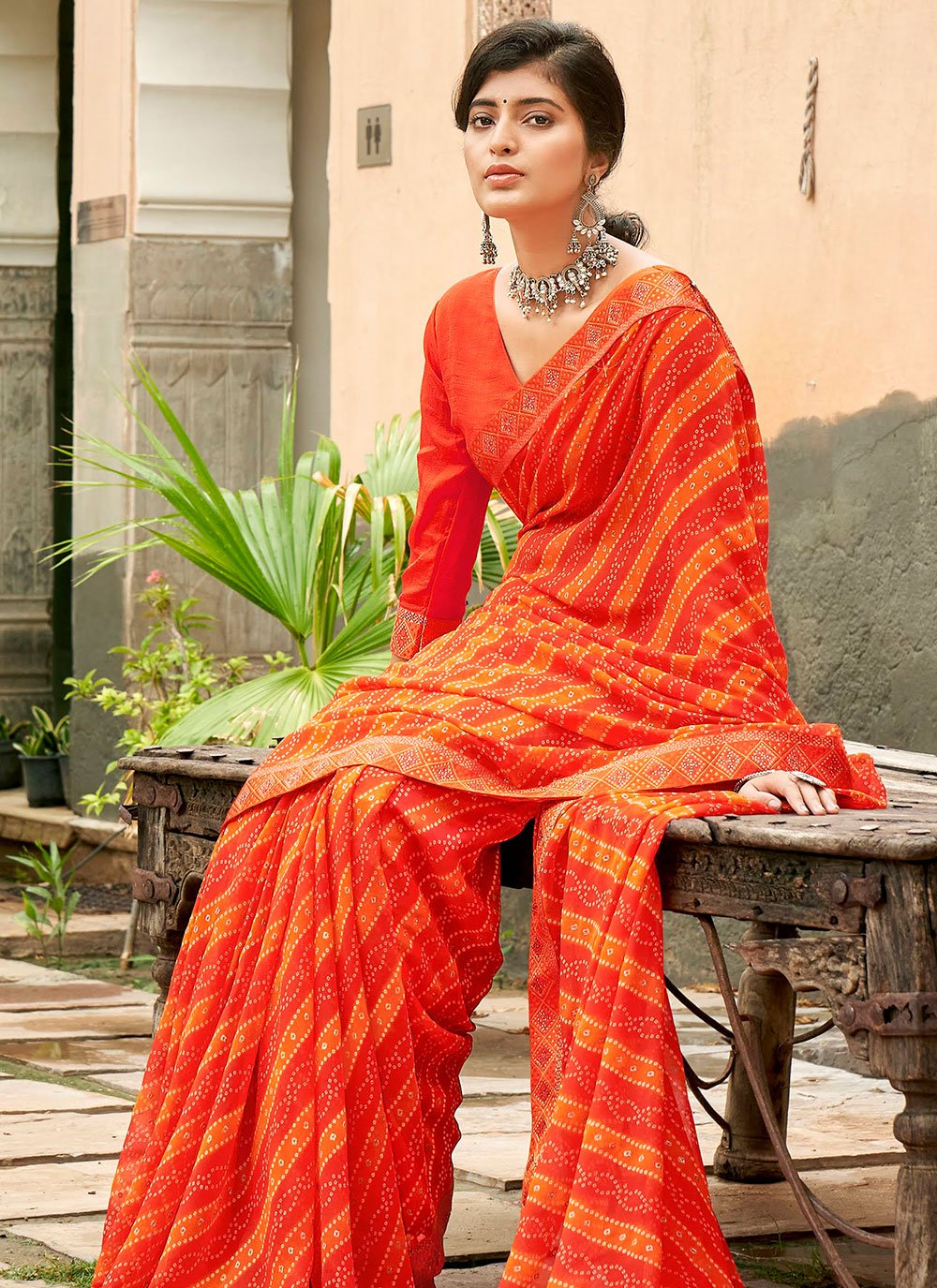 Classic Georgette Orange Print Saree