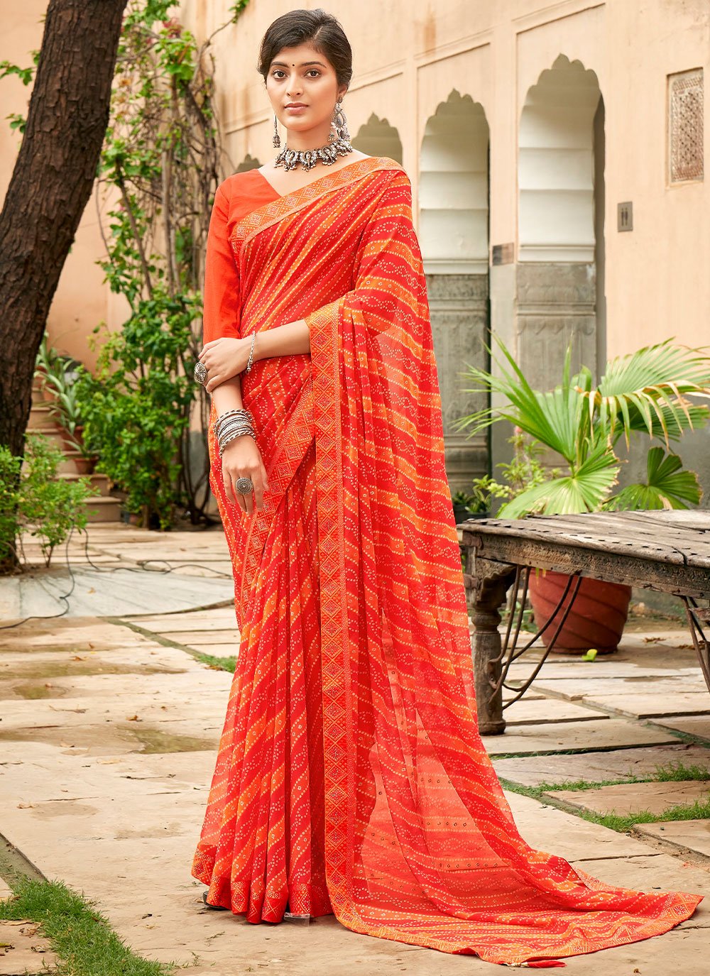 Classic Georgette Orange Print Saree