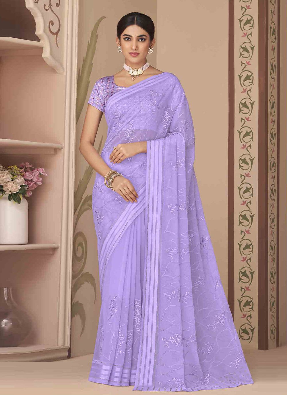 Classic Georgette Purple Embroidered Saree