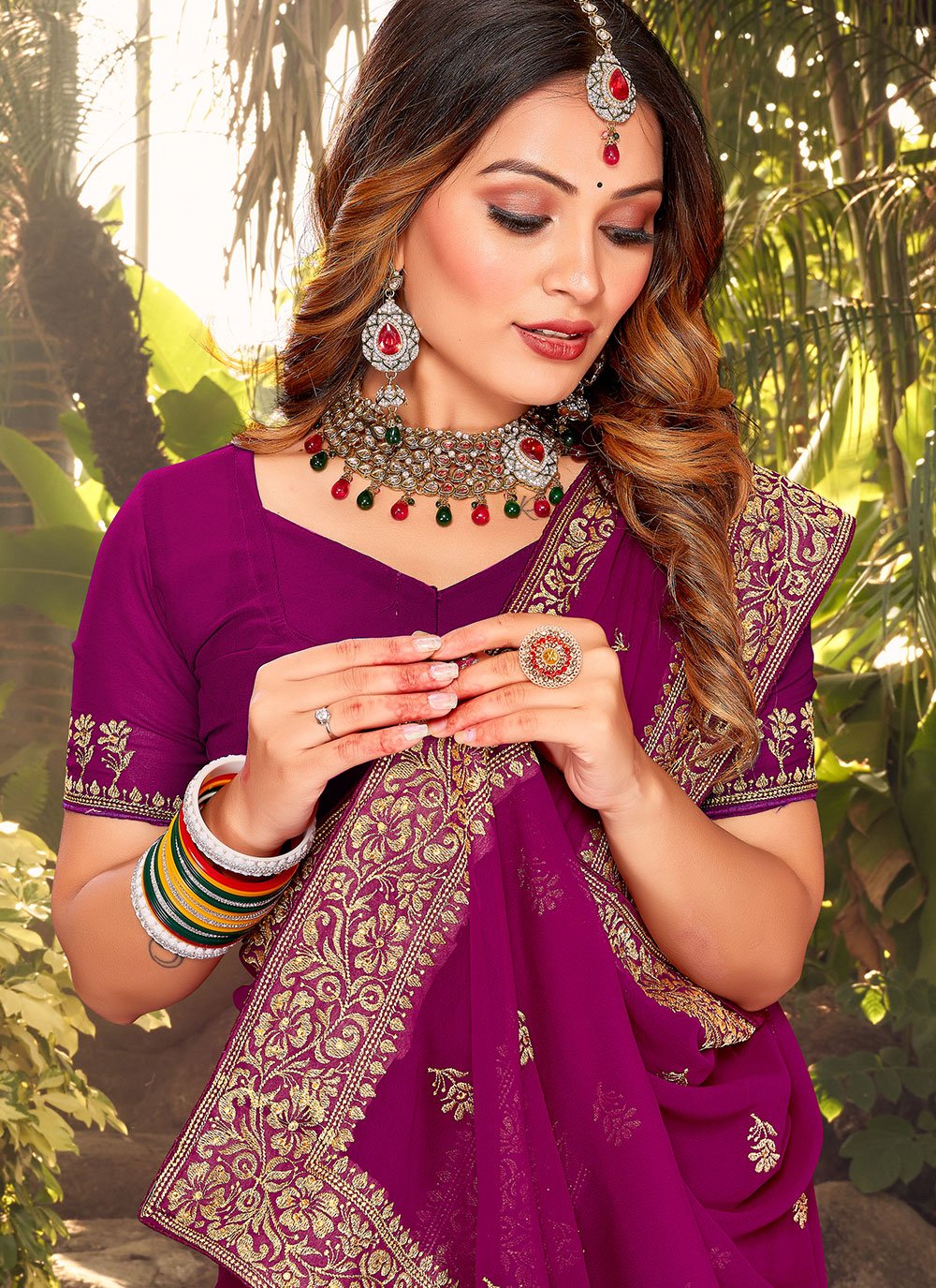 Classic Georgette Purple Embroidered Saree