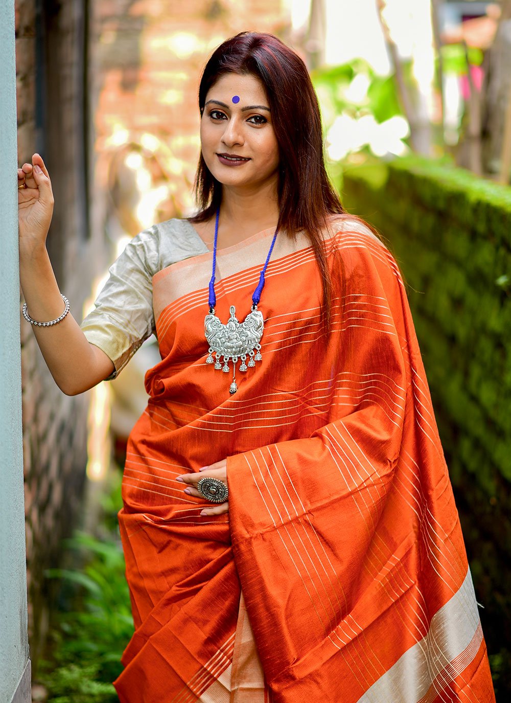 Contemporary Raw Silk Orange Weaving Saree