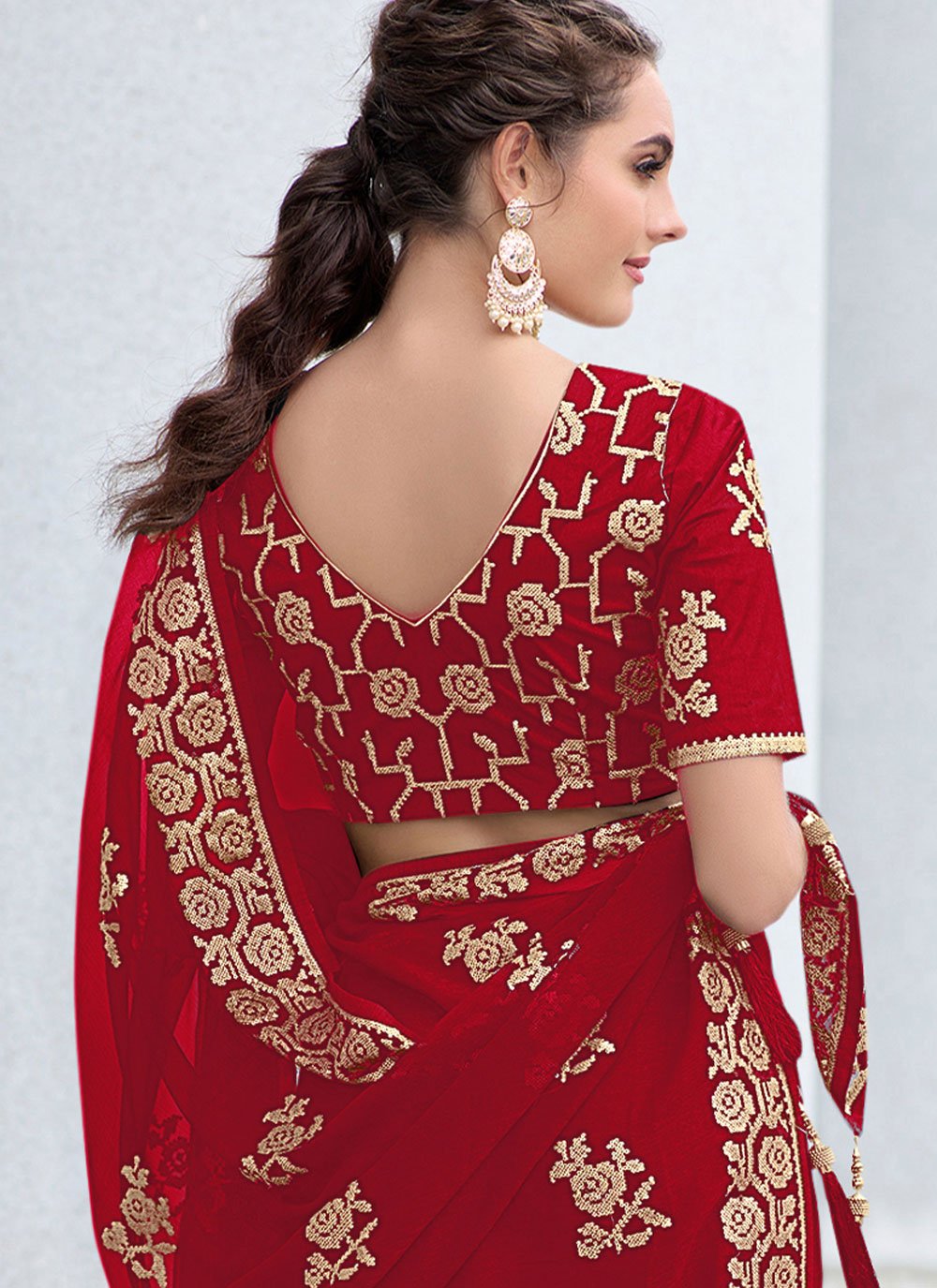 Contemporary Shimmer Red Embroidered Saree