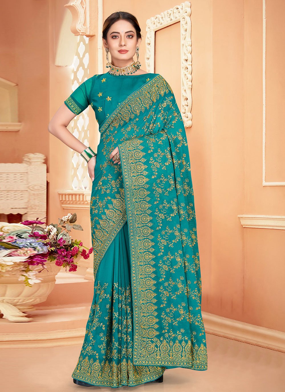 Classic Georgette Turquoise Embroidered Saree