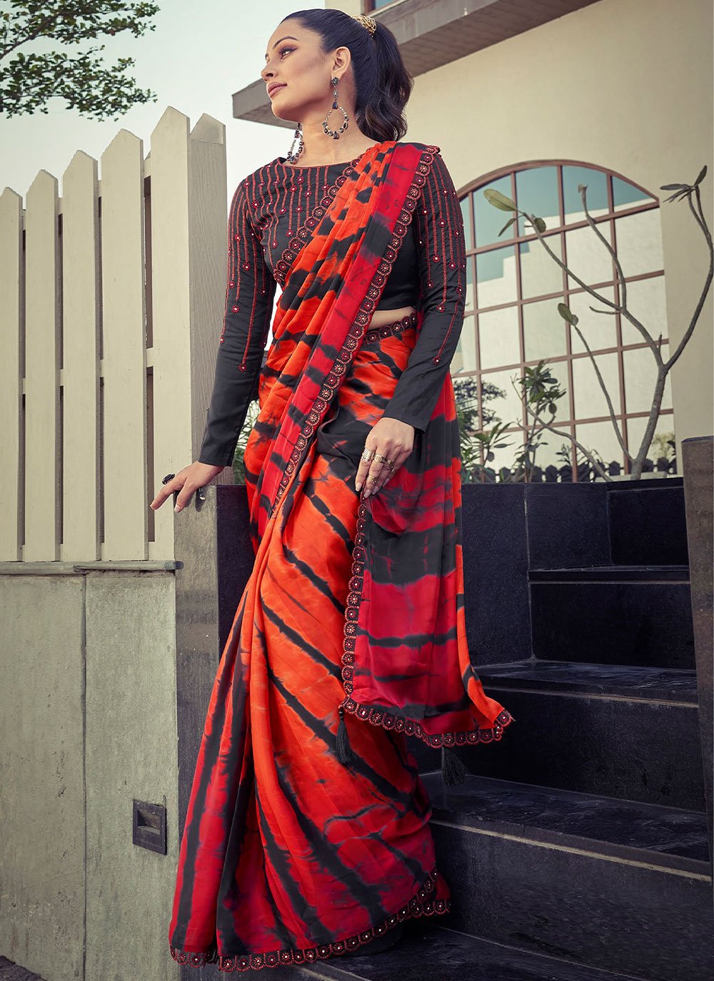 Contemporary Crepe Silk Satin Black Orange Embroidered Saree