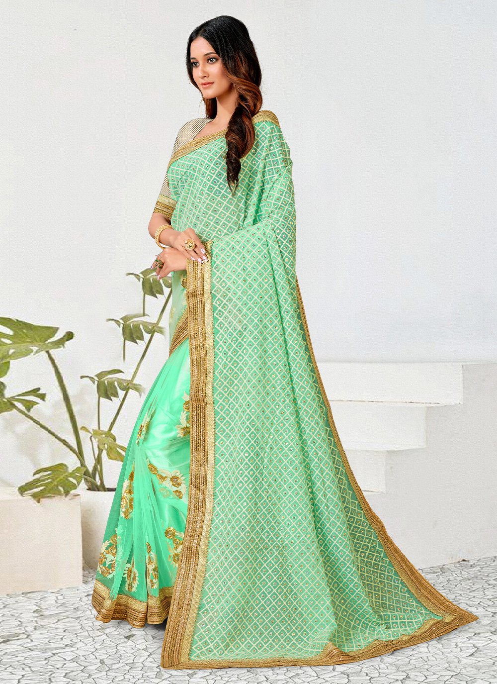 Contemporary Georgette Net Sea Green Patch Border Saree