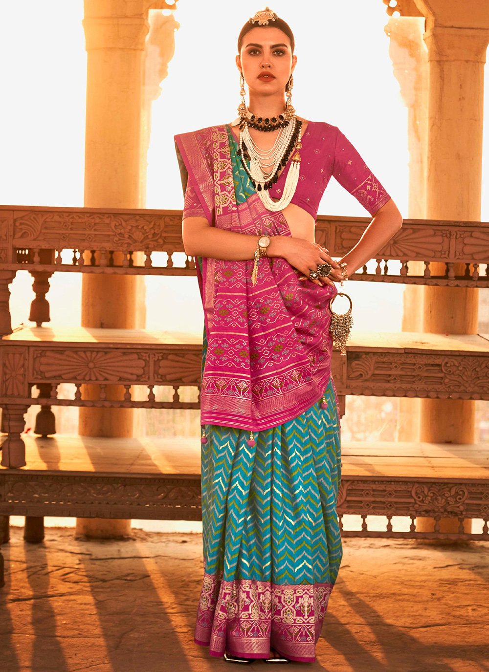 Contemporary Silk Turquoise Patola Print Saree