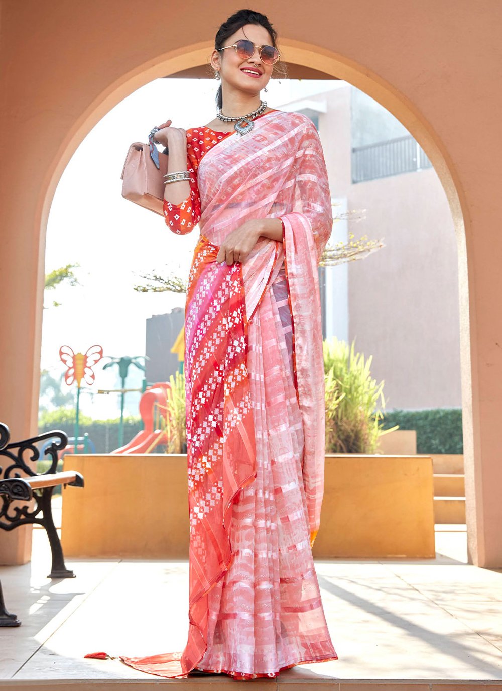 Contemporary Weight Less Peach Embroidered Saree