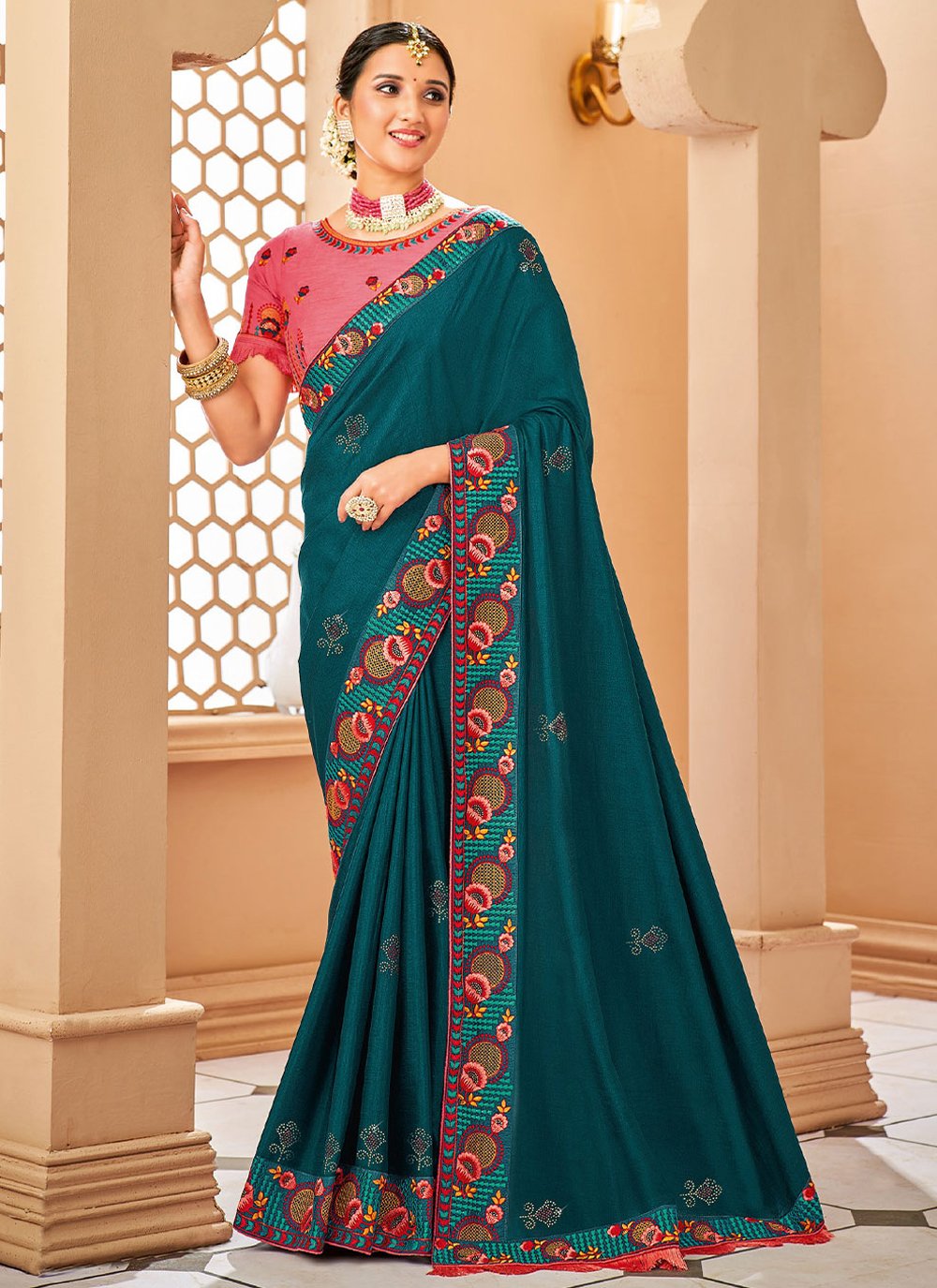 Contemporary Raw Silk Teal Embroidered Saree