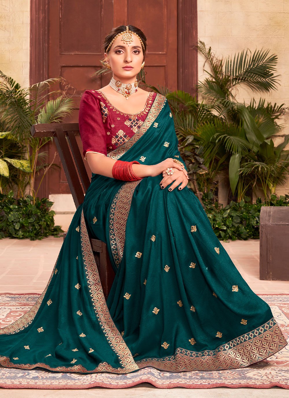 Classic Silk Teal Embroidered Saree