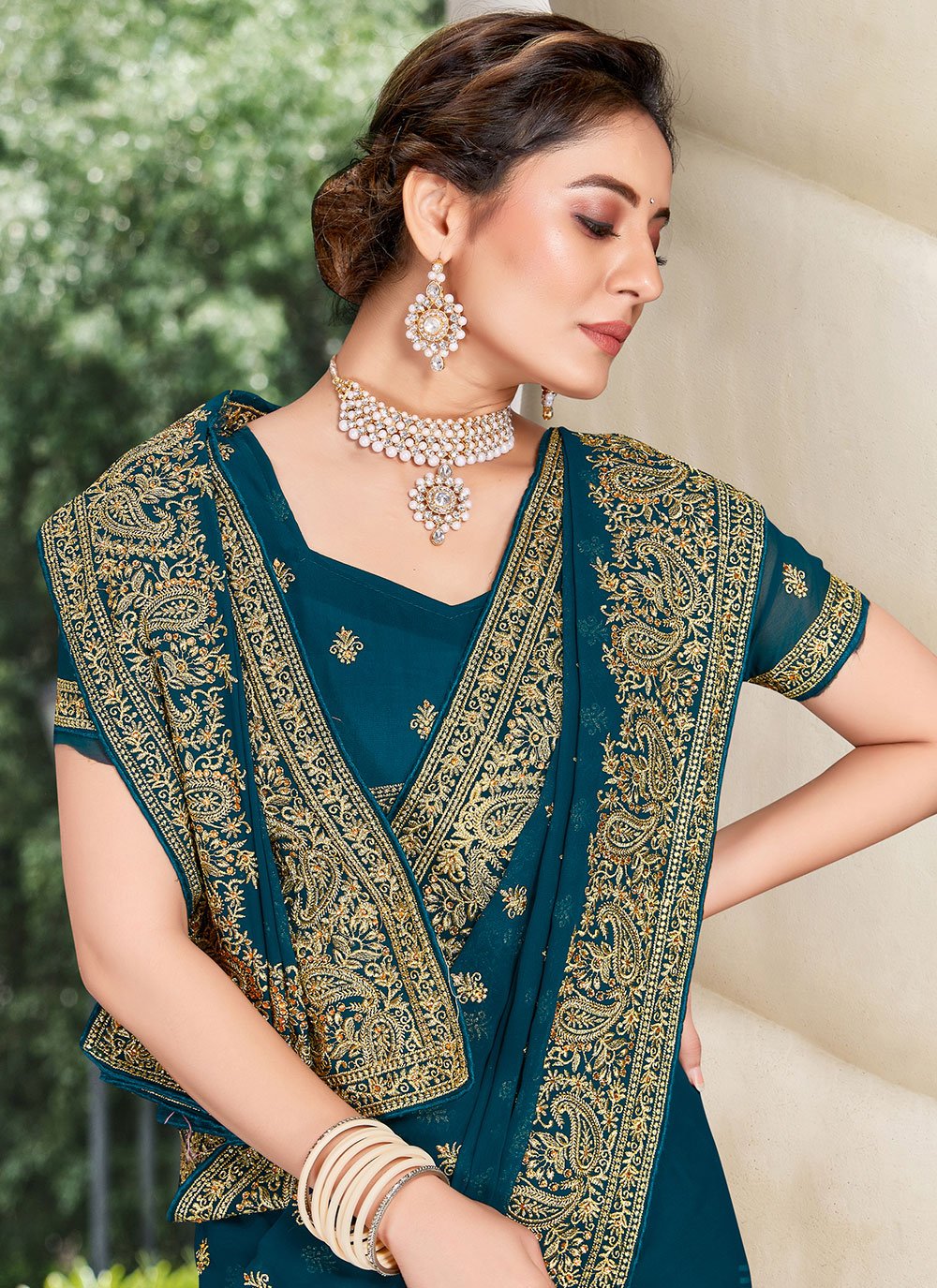 Contemporary Georgette Teal Embroidered Saree