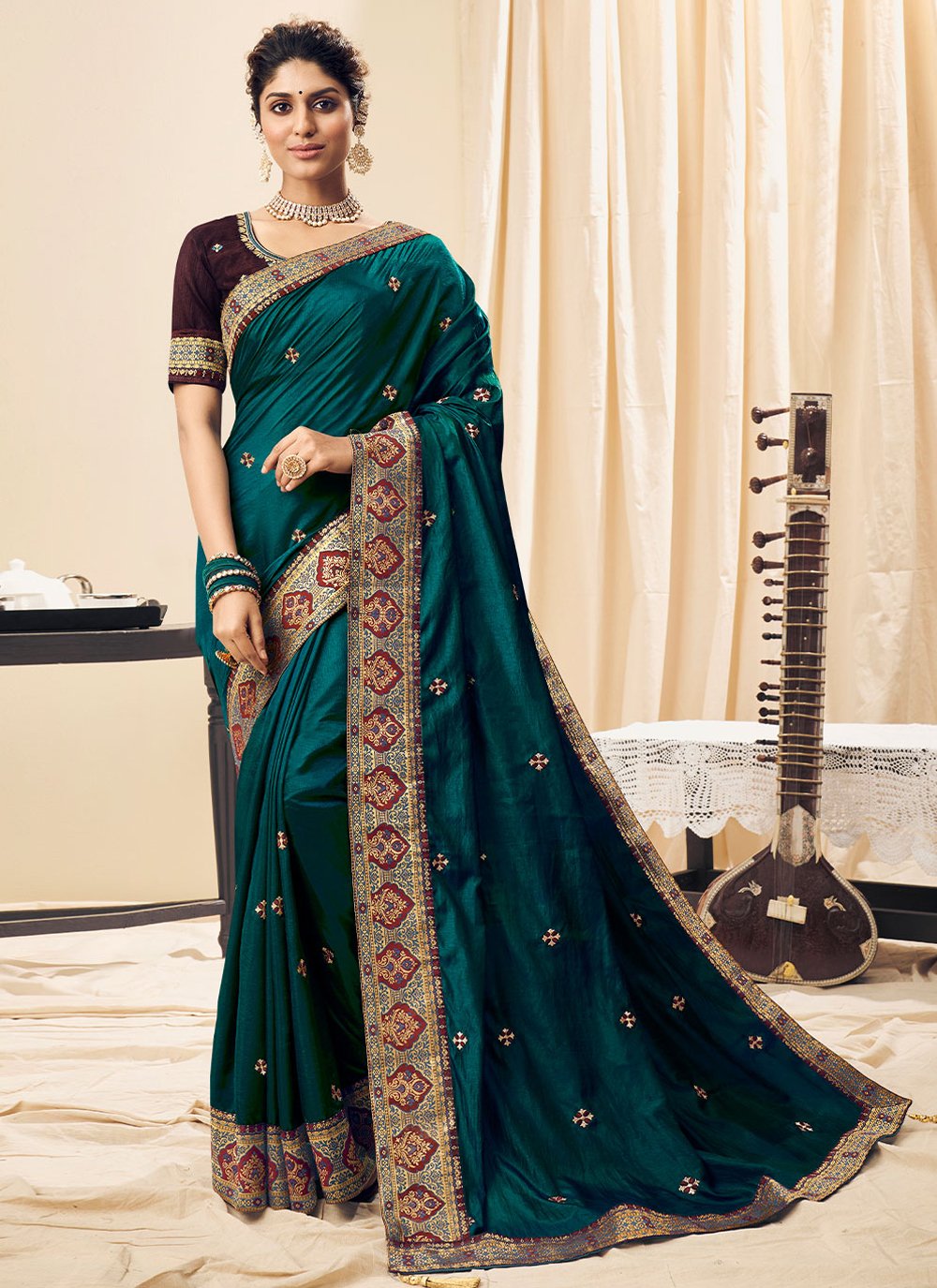 Classic Silk Teal Embroidered Saree