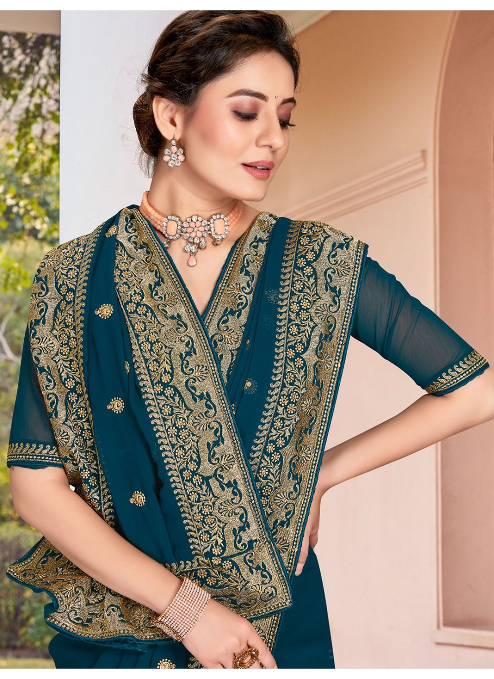 Contemporary Georgette Teal Embroidered Saree