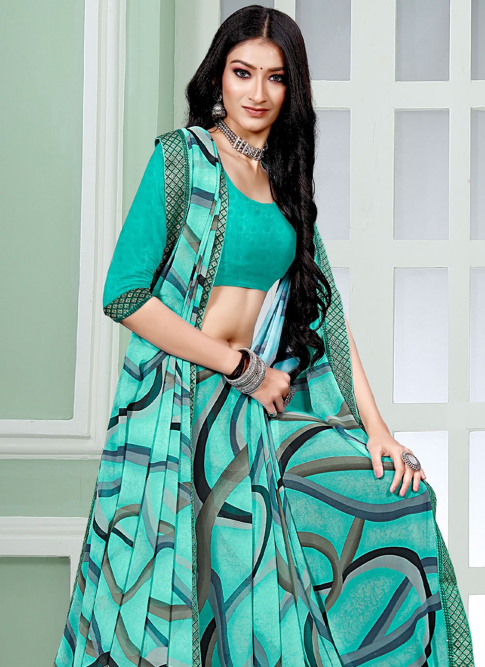 Classic Faux Georgette Turquoise Patch Border Saree