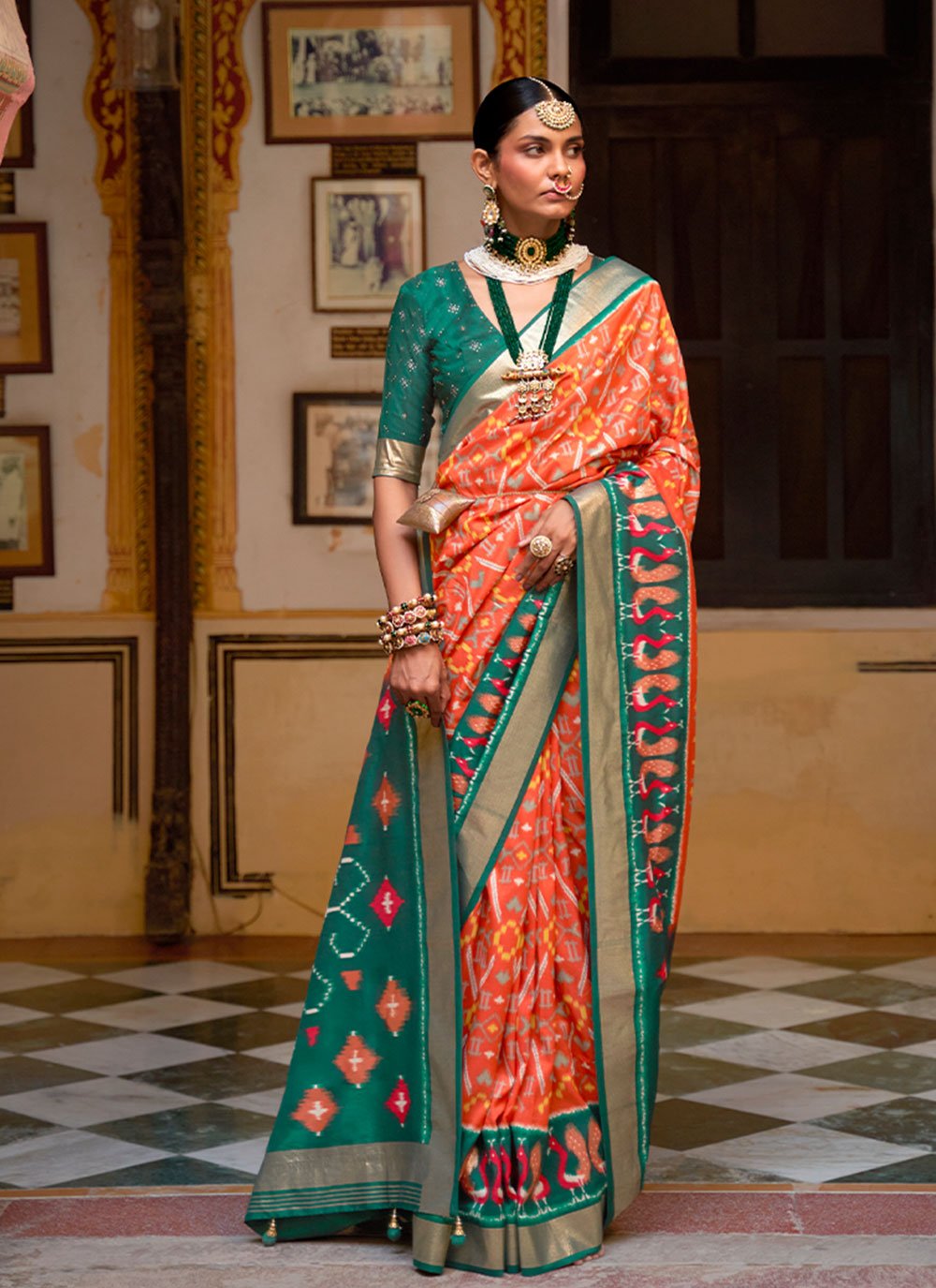 Contemporary Patola Silk Green Orange Weaving Saree