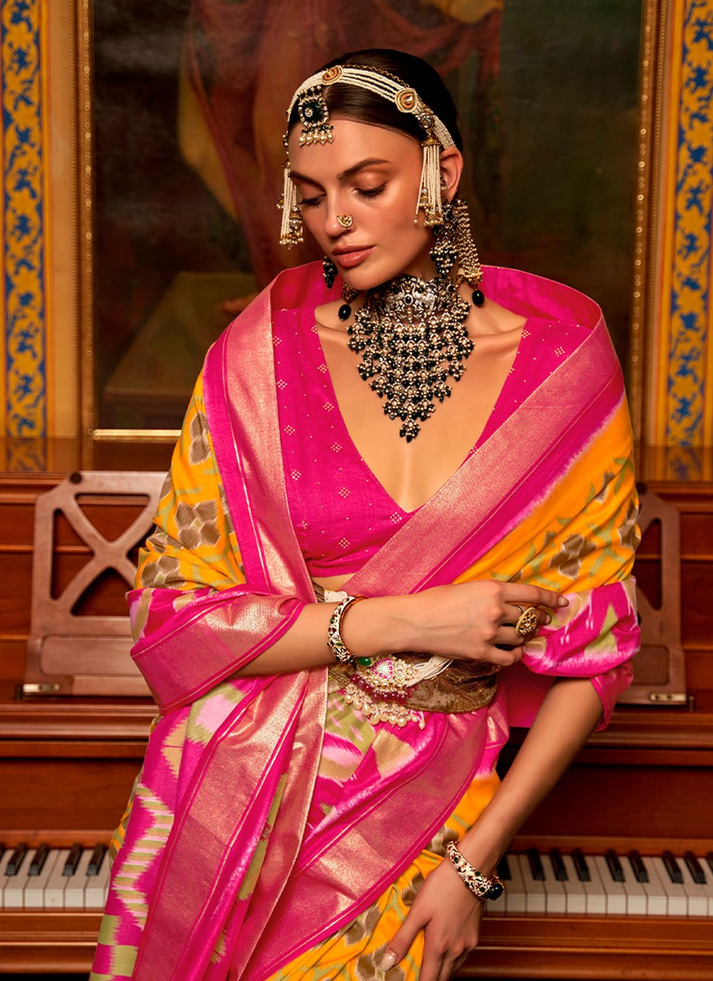 Contemporary Patola Silk Pink Yellow Weaving Saree