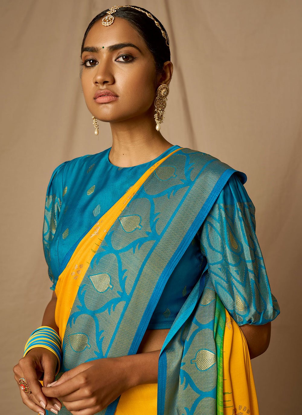 Classic Brasso Blue Orange Woven Saree