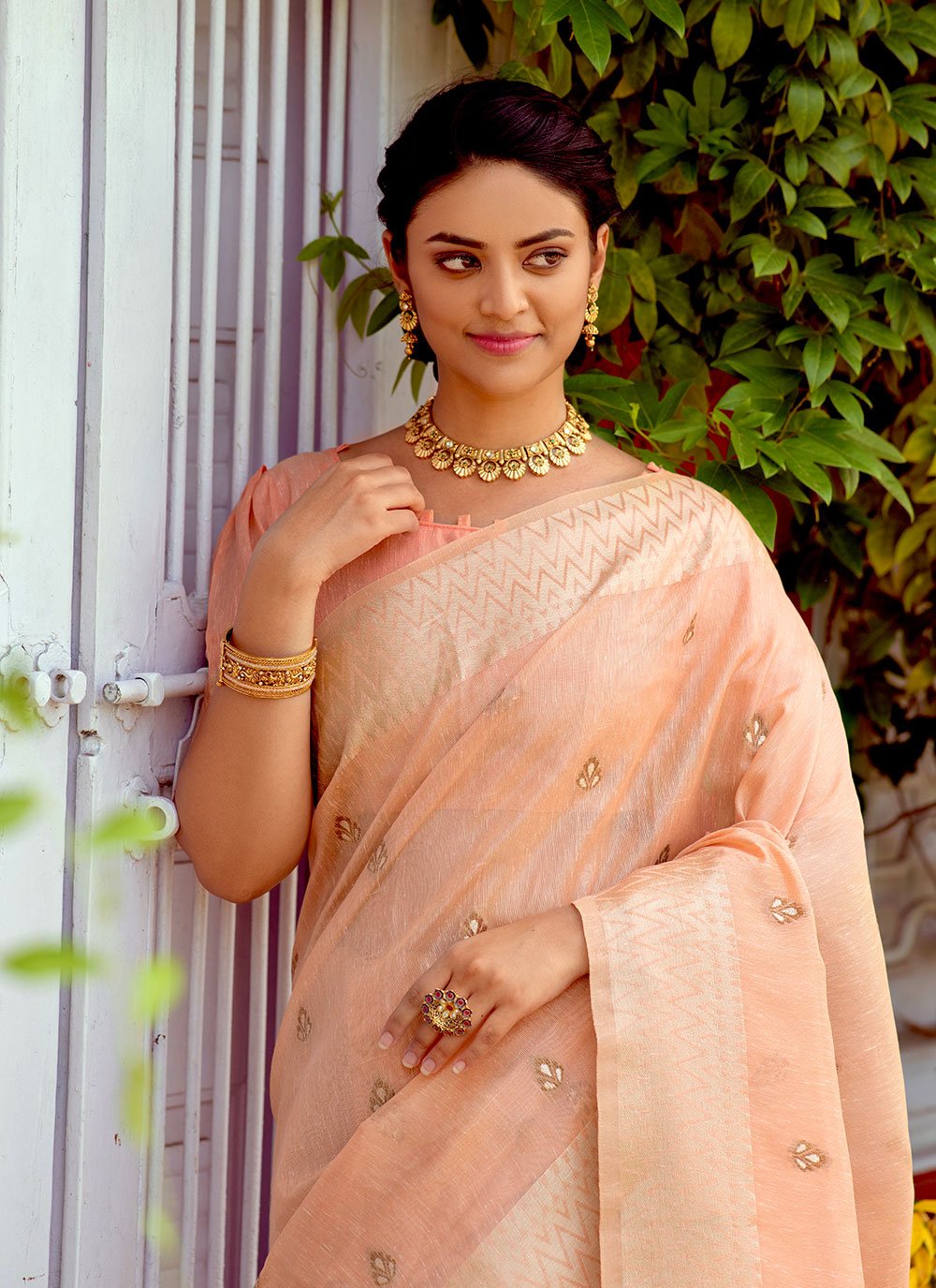 Contemporary Linen Tissue Orange Woven Saree