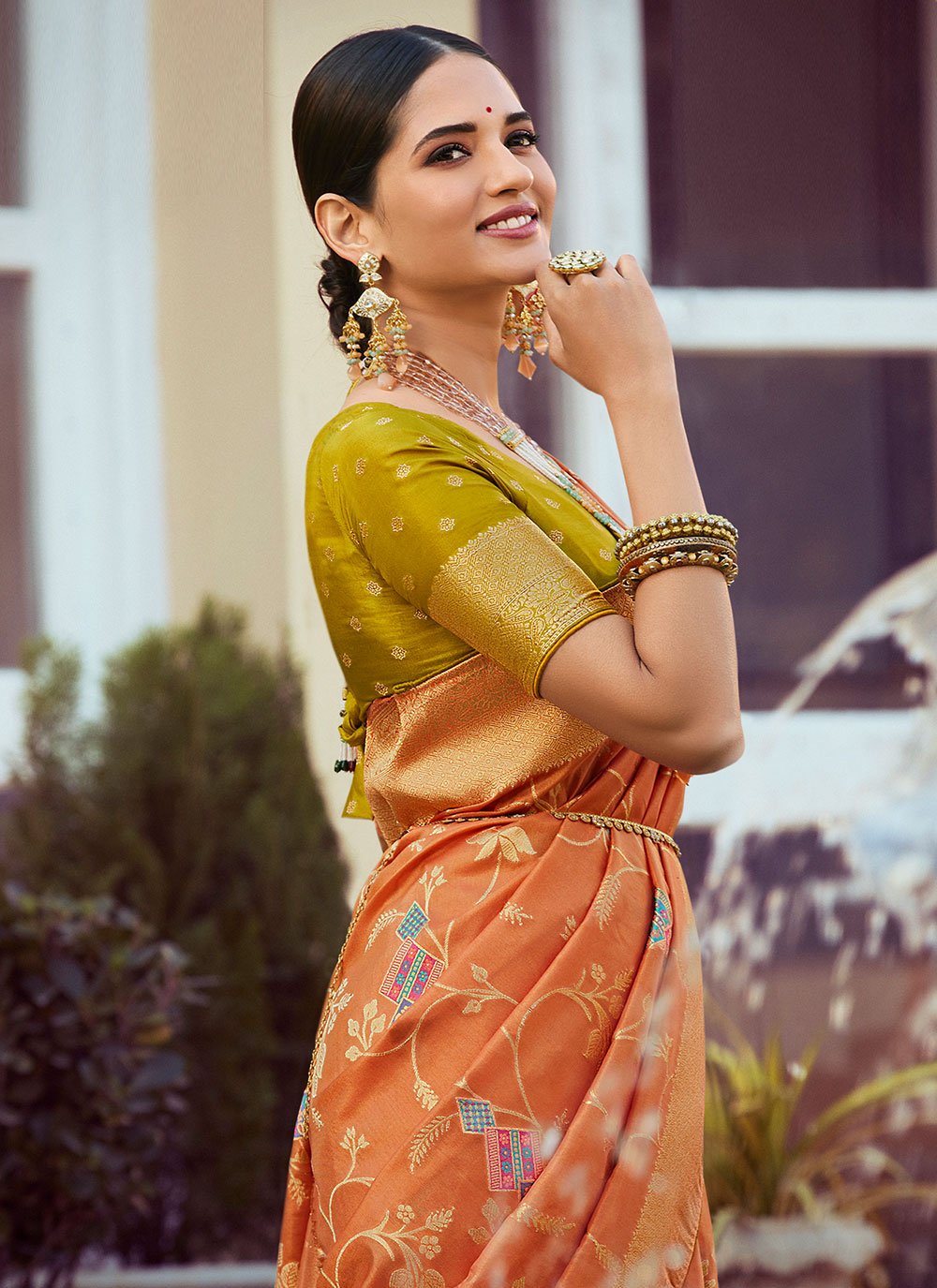 Designer Silk Tissue Orange Woven Saree