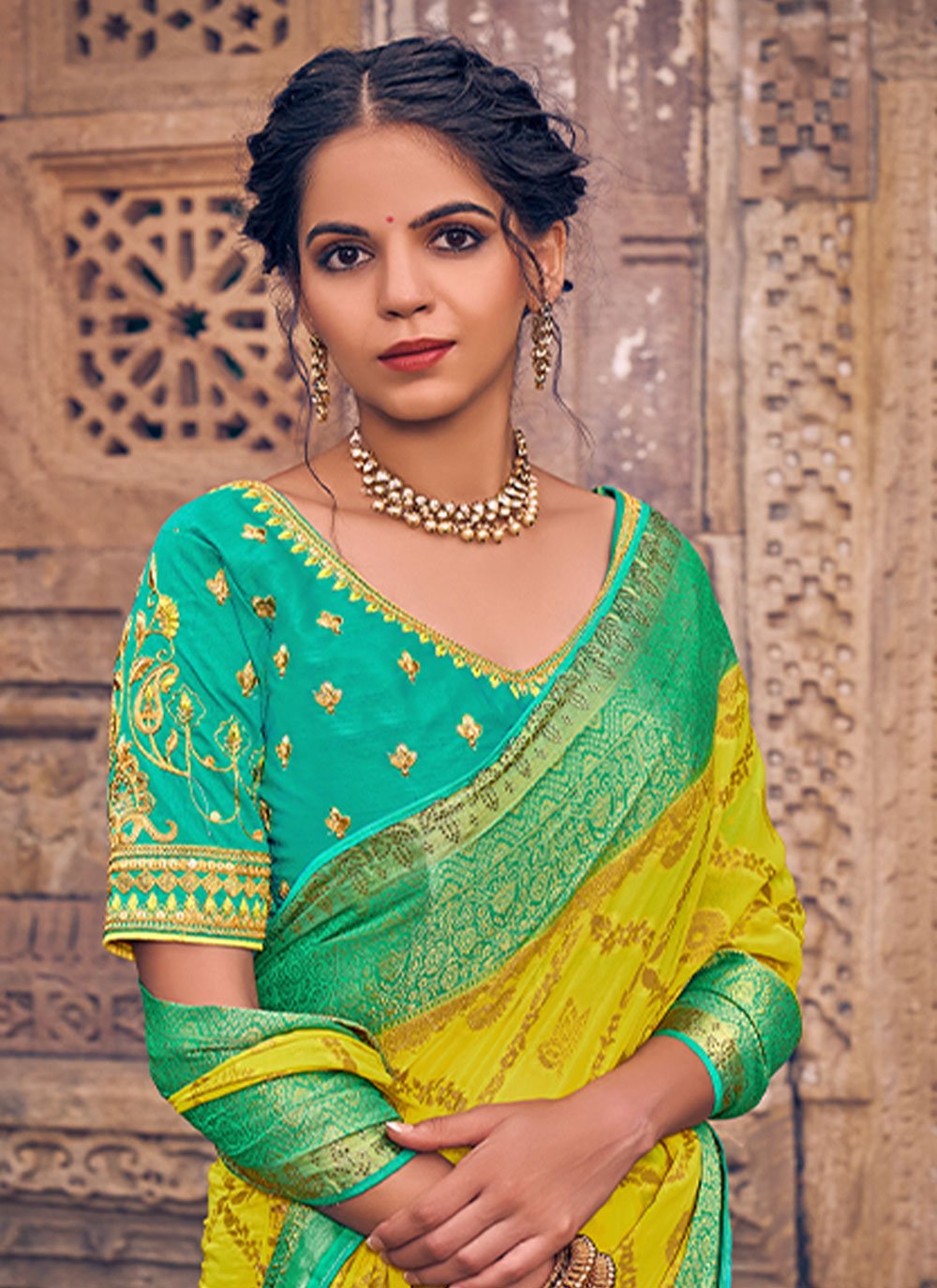 Classic Georgette Yellow Embroidered Saree