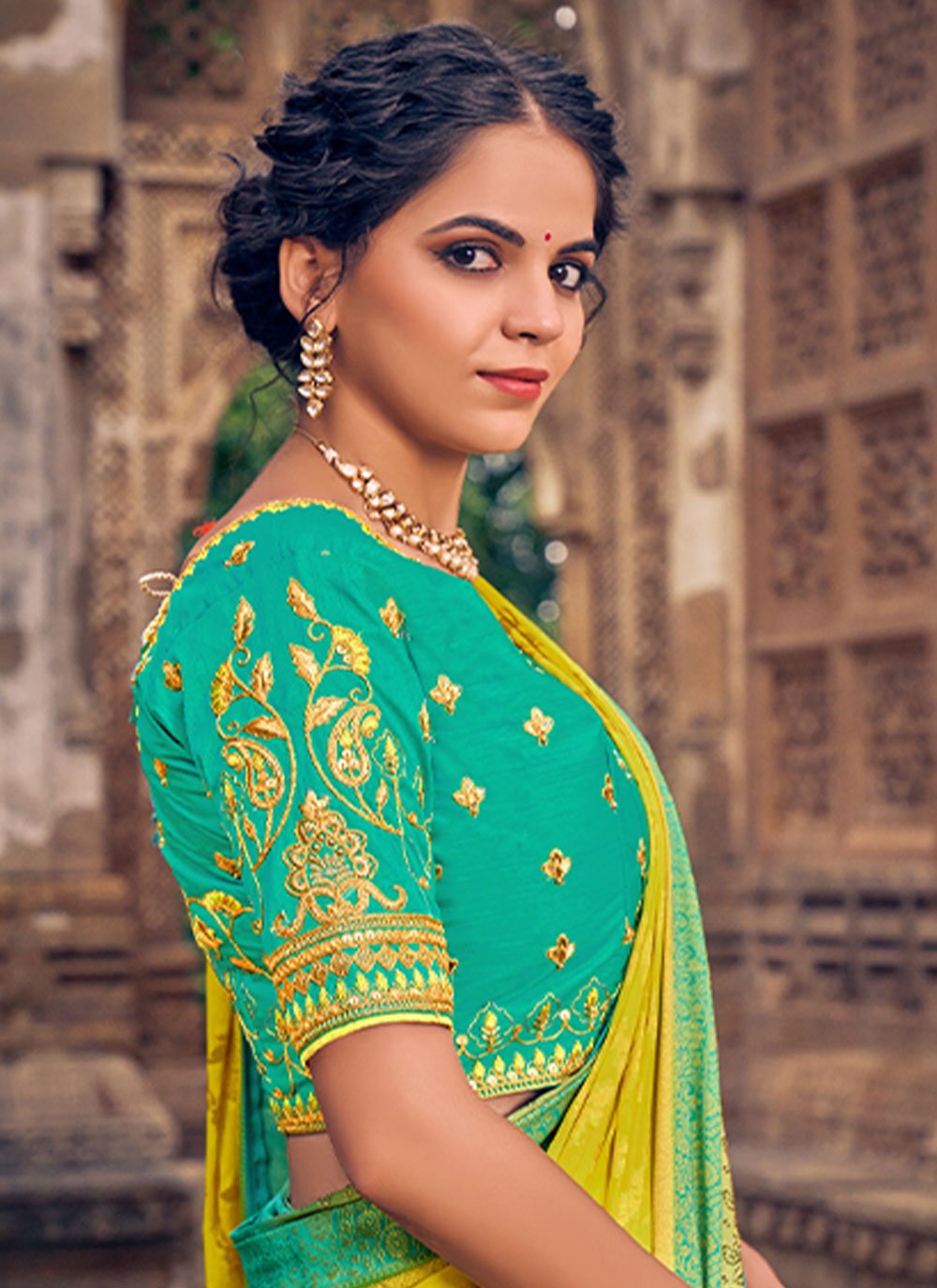 Classic Georgette Yellow Embroidered Saree