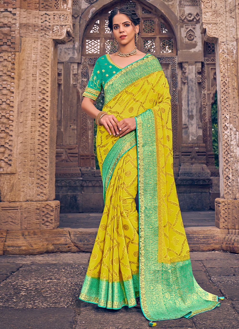 Classic Georgette Yellow Embroidered Saree