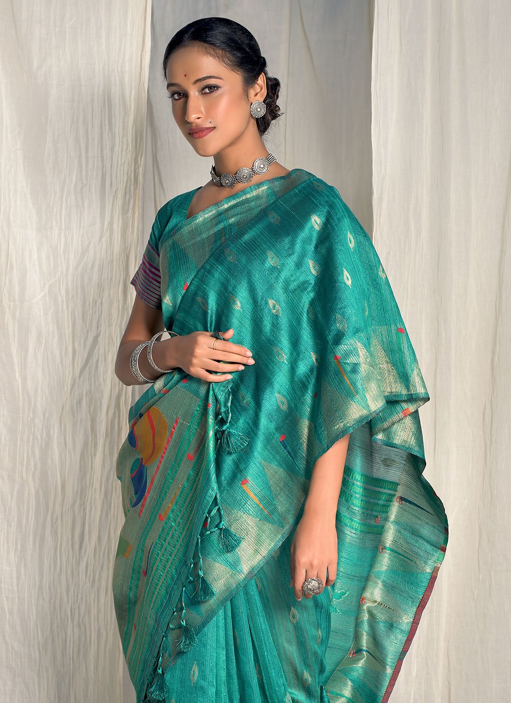 Classic Silk Teal Woven Saree