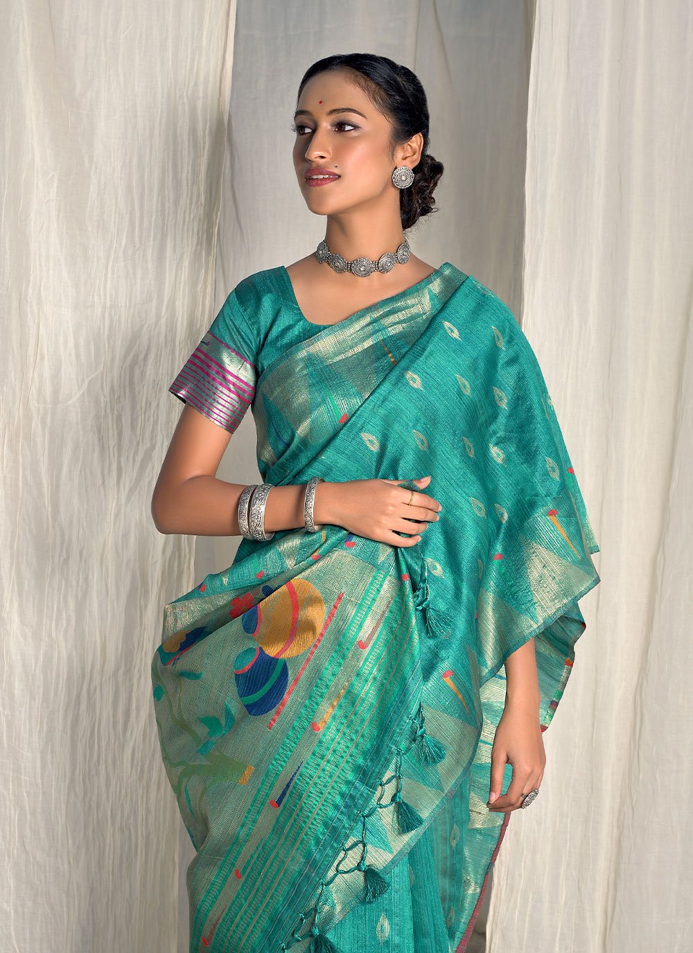 Classic Silk Teal Woven Saree